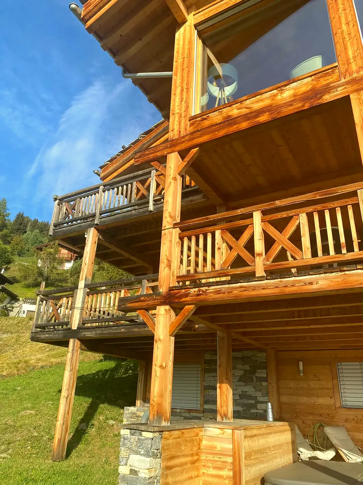 Wooden balconies of the chalet in summer